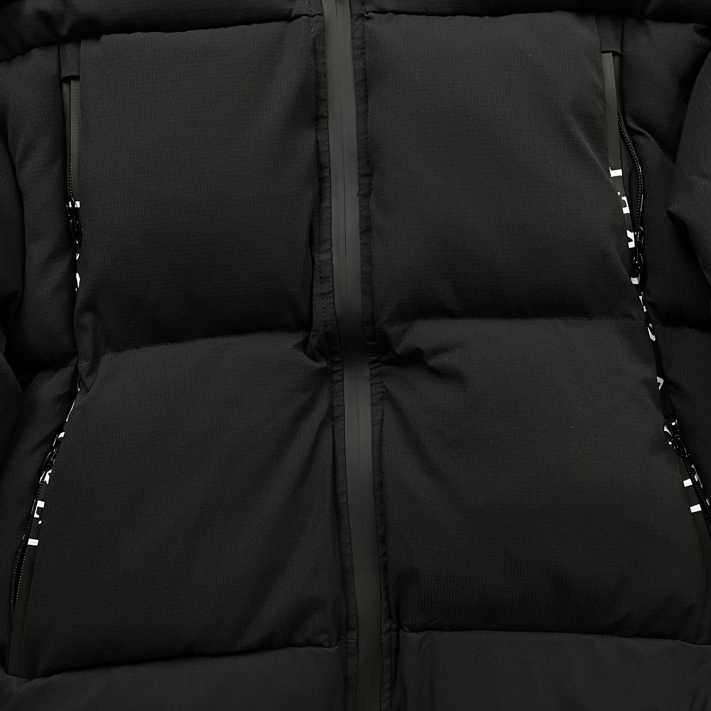 Trapstar x Awful Lot of Cough Syrup Puffer Jacket Black