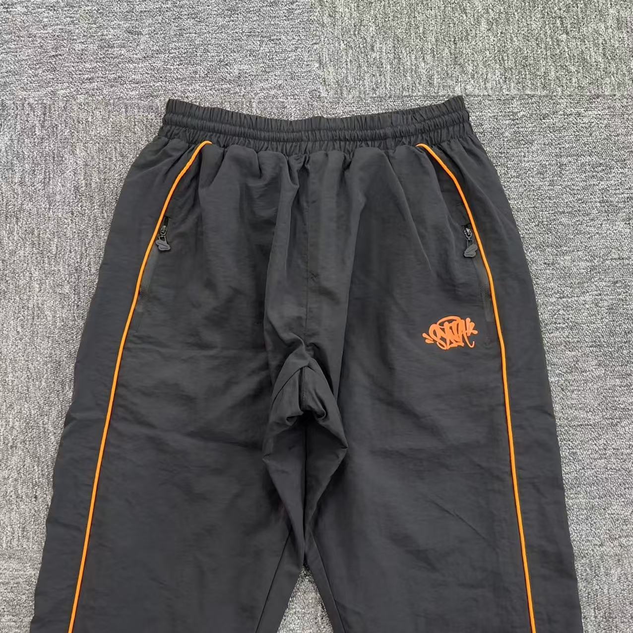 Syna World x CRG Shell Tracksuit Black