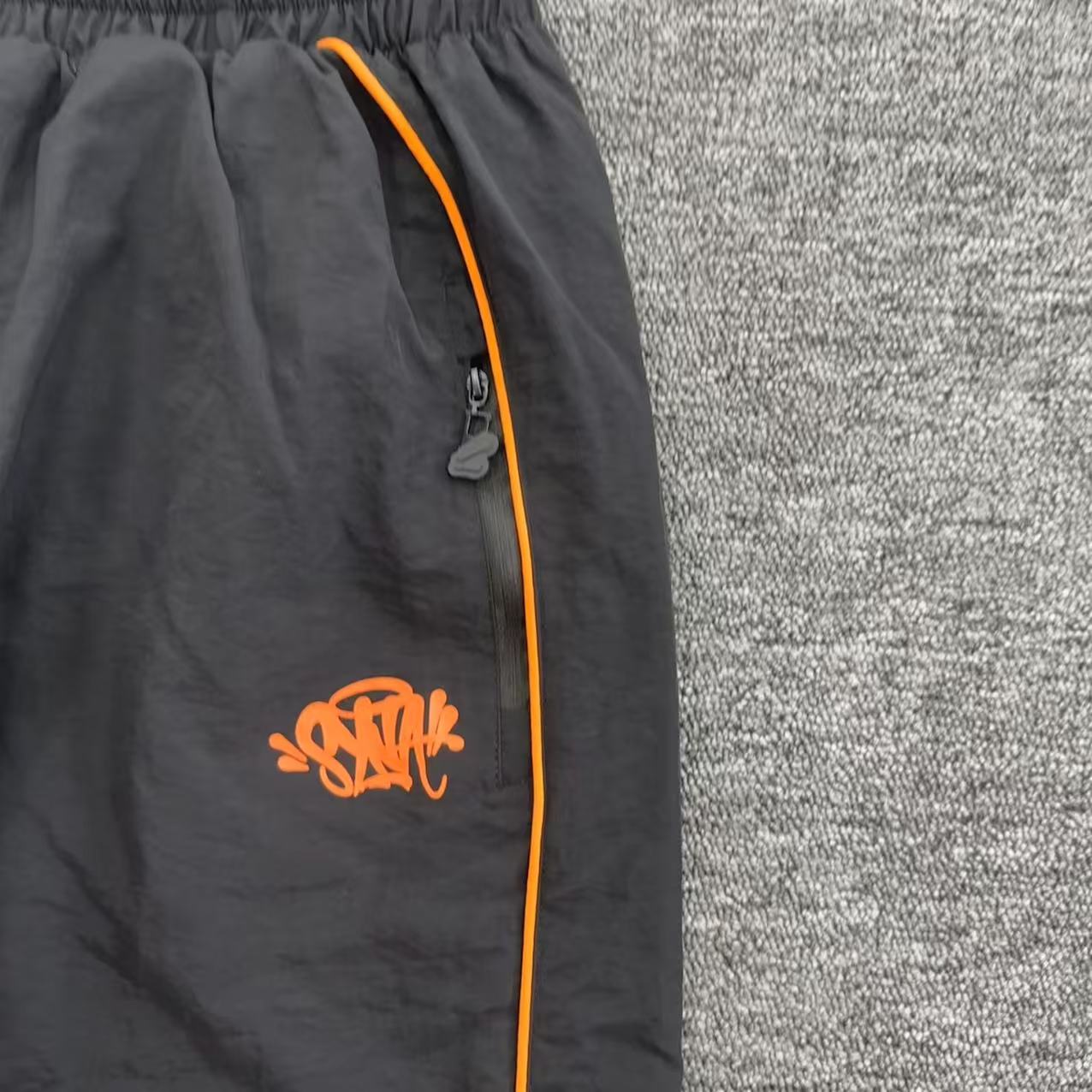 Syna World x CRG Shell Tracksuit Black